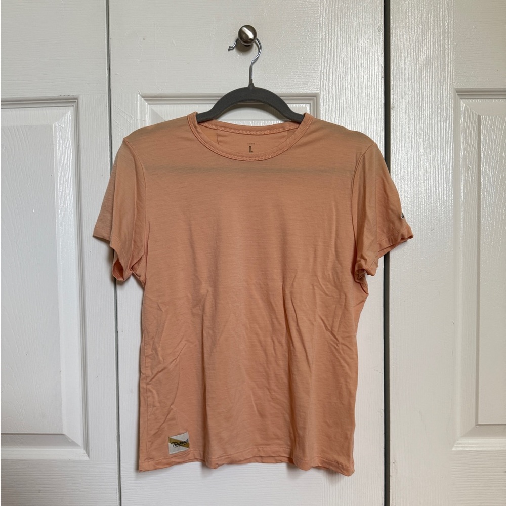 Tracksmith | Short Sleeve Harrier Tee in Peach Apricot Orange Size L